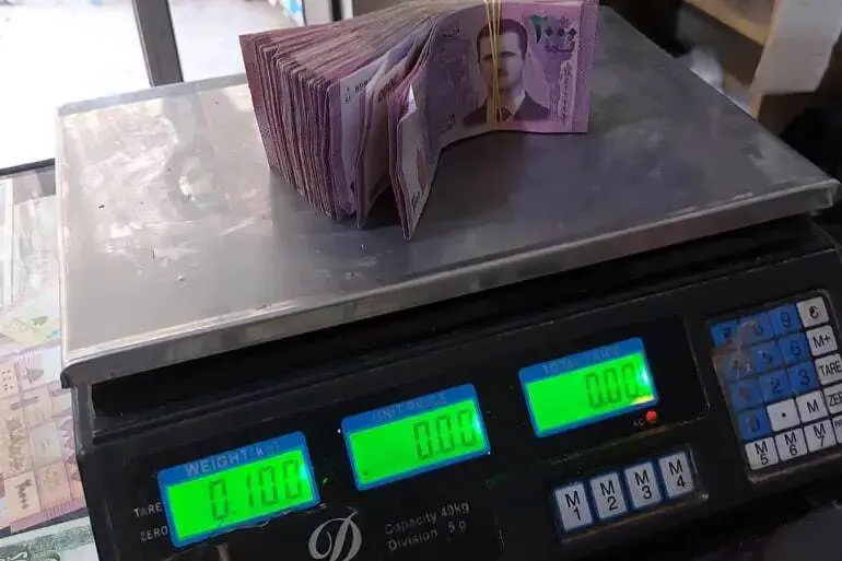 کێشکردنی دراوەکان لە سووریا بەهۆی دابەزینی بەهای دراو ەوە