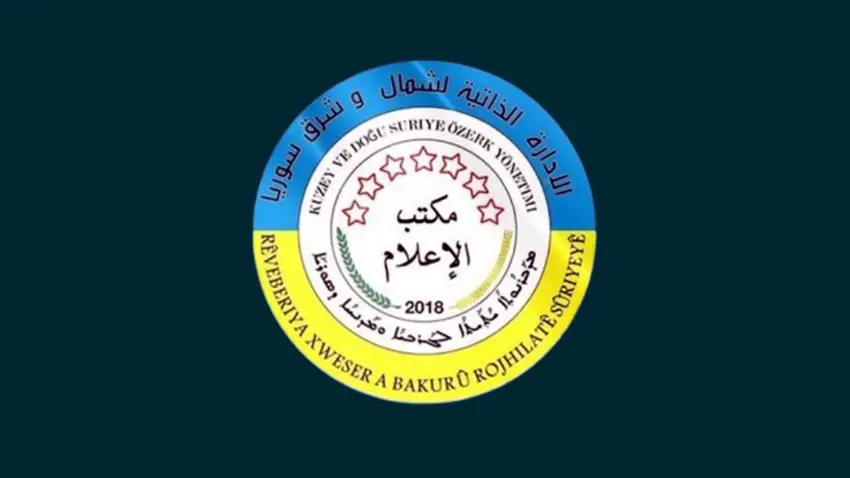 Rêveberiya Rojava salvegera rûxandina rejîma Esed pîroz kir û rêveberiya nû rexne kir