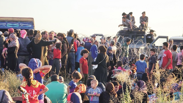 Di ser serê koçberan de sîlihan berdan