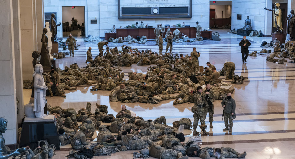 ژمارەیەکی زۆر لە سەربازانی ئەمریکی لە مەراسیمی ڕاسپاردەکردنی بایدن وەک سەرۆککۆمار تووشی کۆرۆنا بوون